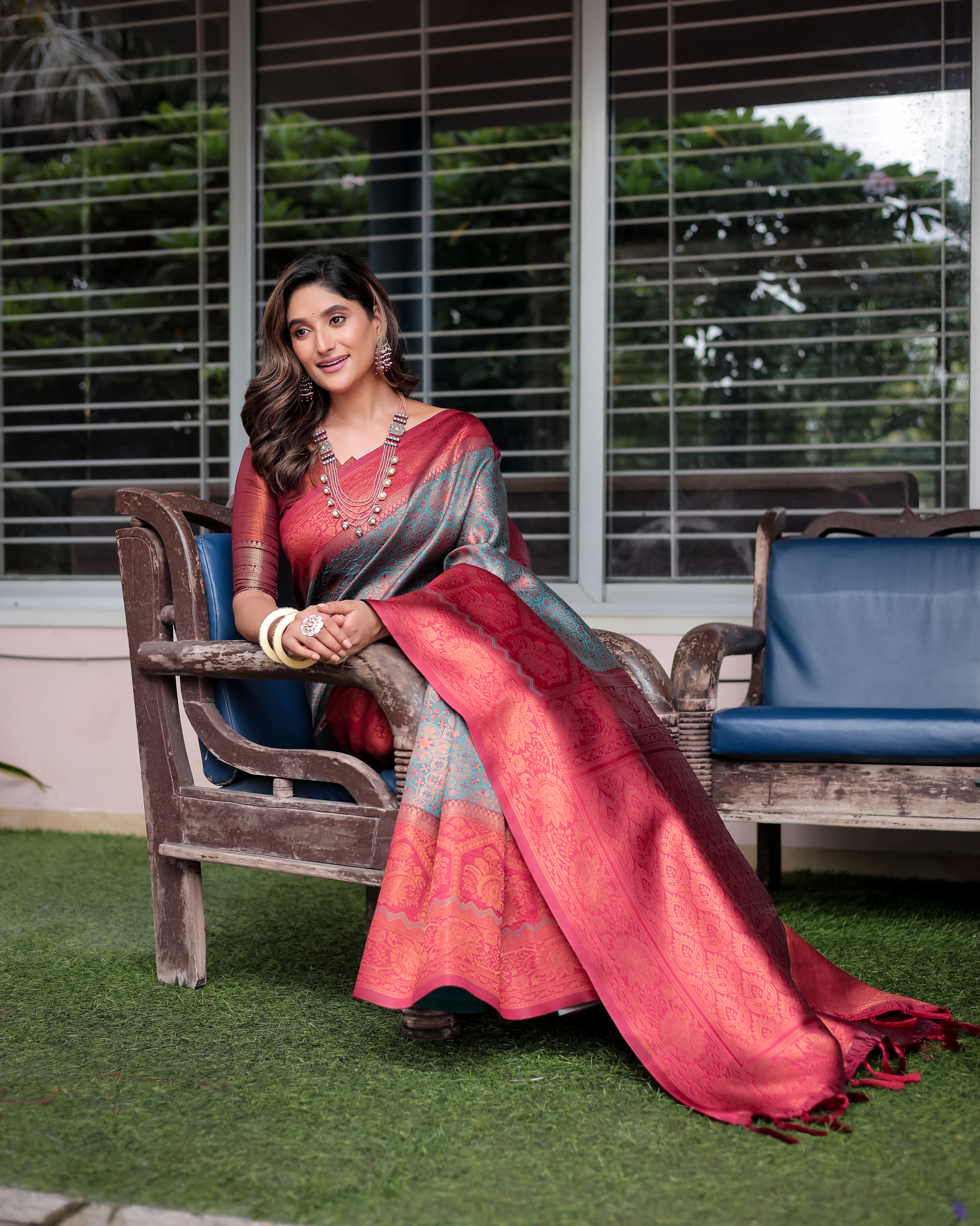 Turquoise Designer Tassels Premium Banarsi Silk Saree