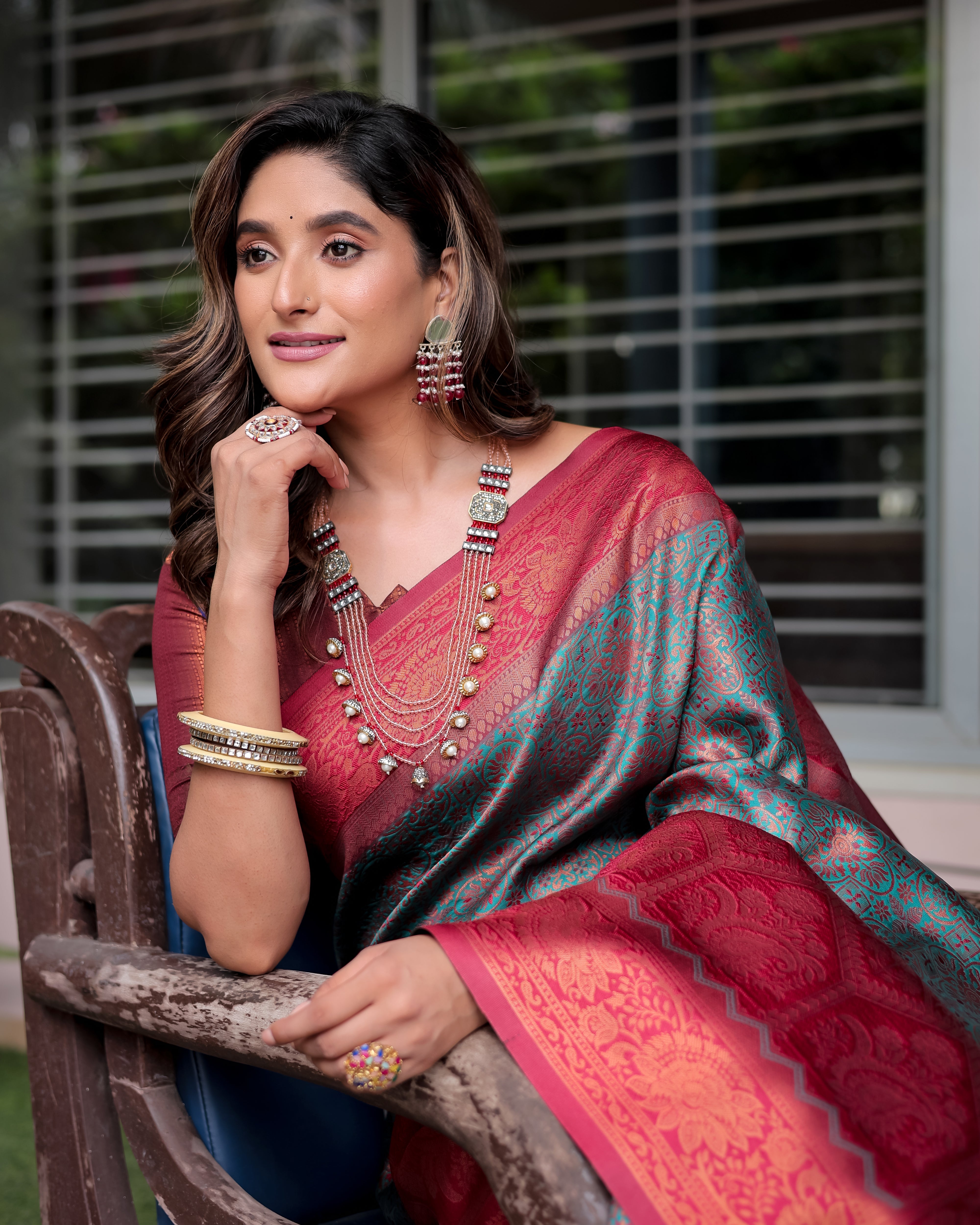 Turquoise Designer Tassels Premium Banarsi Silk Saree